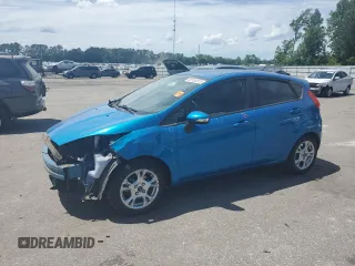 2015 Ford Fiesta SE z VIN 3FADP4EJ8FM148267, wystawiony jako Copart lot #58153815 z przebiegiem 123 778 mil mil oraz Szkoda całkowita • Salvage title. Historia ofert i sprzedaży dostępna na DreamBid. Obrazek 1.