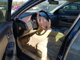 2010 Jaguar XF Premium Luxury with VIN SAJWA0GB4ALR57747, listed as a IAAI auction lot 41305704 with 133,711 mi miles. Bid and sale history available at carsss.com. Image 5.