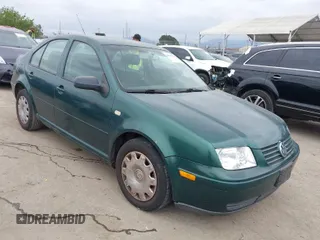 2000 Volkswagen Jetta z VIN 3VWSC29M7YM127772, wystawiony jako IAAI lot #42045915 z przebiegiem 125 730 mil mil oraz . Historia ofert i sprzedaży dostępna na DreamBid. Obrazek 1.