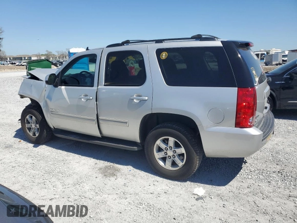 2011 GMC Yukon SLE with VIN 1GKS1AE00BR102325, listed as a Copart auction lot 48973145 with 223,109 mi miles and Salvage Title. Bid and sale history available at carsss.com. Image 2.
