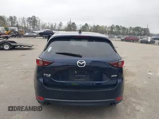 2017 Mazda CX-5 Touring with VIN JM3KFBCL9H0163449, listed as a IAAI auction lot 41919020 with 102,898 mi miles. Bid and sale history available at carsss.com. Image 16.
