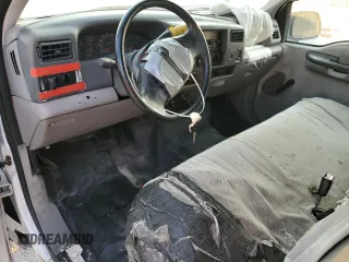 2000 Ford Super Duty F-250 XL with VIN 1FTNF21F7YEA97991, listed as a Copart auction lot 54577544 with 82,036 mi miles and Salvage Title. Bid and sale history available at carsss.com. Image 8.