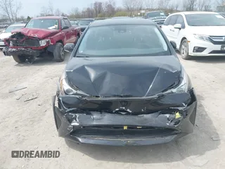 2017 Toyota Prius Two with VIN JTDKARFUXH3041931, listed as a IAAI auction lot 42075004 with 75,768 mi miles and . Bid and sale history available at DreamBid. Image 12.