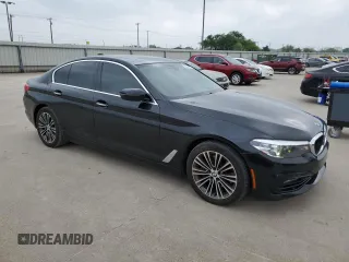 2018 BMW 5 Series 530i with VIN WBAJA5C53JWA36897, listed as a Copart auction lot 51433675 with 135,214 mi miles and Clean Title. Bid and sale history available at DreamBid. Image 4.