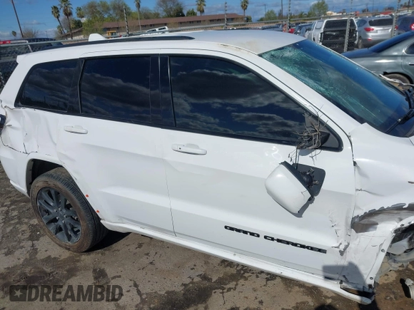 2018 Jeep Grand Cherokee Laredo E with VIN 1C4RJEAG4JC193539, listed as a IAAI auction lot 41827154 with 79,784 mi miles. Bid and sale history available at carsss.com. Image 16.