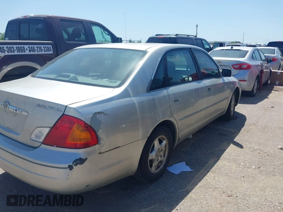 2000 Toyota Avalon XL with VIN 4T1BF28B5YU027140, listed as a IAAI auction lot 42005055 with 138,364 mi miles and . Bid and sale history available at DreamBid. Image 4.