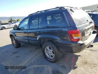 1999 Jeep Grand Cherokee Limited with VIN 1J4GW68N9XC743436, listed as a Copart auction lot 86803524 with 129,204 mi miles and Clean Title. Bid and sale history available at carsss.com. Image 2.