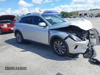 2021 Infiniti QX50 Luxe z VIN 3PCAJ5BB7MF113464, wystawiony jako IAAI lot #41901603 z przebiegiem 103 631 mil mil oraz . Historia ofert i sprzedaży dostępna na DreamBid. Obrazek 1.