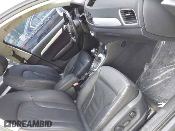 2015 Audi Q3 Premium Plus z VIN WA1EFCFS8FR001278, wystawiony jako IAAI lot #42475043 z przebiegiem 125 417 mil mil oraz . Historia ofert i sprzedaży dostępna na DreamBid. Obrazek 5.