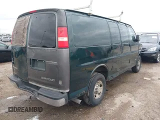 2004 Chevrolet Express Cargo Van with VIN 1GCGG25U541120927, listed as a IAAI auction lot 41279971 with 181,985 mi miles. Bid and sale history available at carsss.com. Image 4.