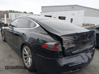 2018 Tesla Model S 75D with VIN 5YJSA1E24JF259874, listed as a IAAI auction lot 41921382 with 82,182 mi miles and . Bid and sale history available at DreamBid. Image 3.