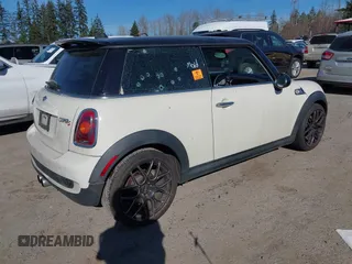 2009 MINI Hardtop S with VIN WMWMF73519TT99560, listed as a IAAI auction lot 41691939 with Not provided miles and . Bid and sale history available at DreamBid. Image 4.
