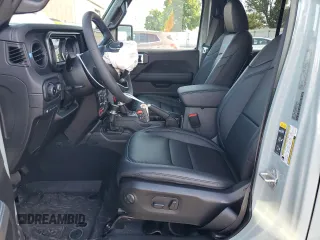 2024 Jeep Wrangler Rubicon z VIN 1C4RJXR64RW279791, wystawiony jako Copart lot #61348324 z przebiegiem 1 387 mil mil oraz Szkoda całkowita • Salvage title. Historia ofert i sprzedaży dostępna na DreamBid. Obrazek 7.