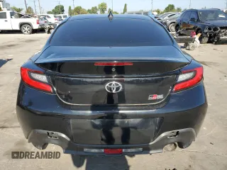 2023 Toyota 86 с VIN JF1ZNBB13P9750286, выставлен на аукционе Copart как лот 57180095 с пробегом 11 630 миль миль и Списание • Salvage title. История ставок и продаж доступна на DreamBid. Изображение 6.