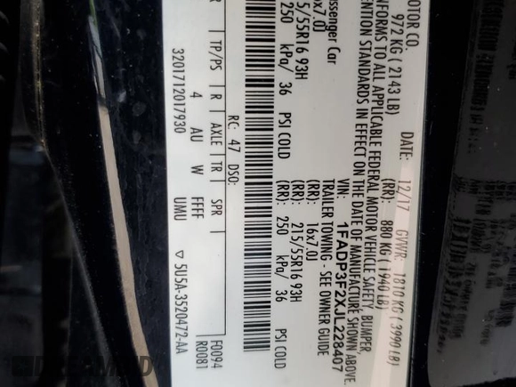 2018 Ford Focus SE z VIN 1FADP3F2XJL228407, wystawiony jako Copart lot #59254415 z przebiegiem 75 241 mil mil oraz Szkoda całkowita • Salvage title. Historia ofert i sprzedaży dostępna na DreamBid. Obrazek 12.