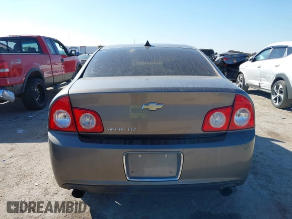 2012 Chevrolet Malibu LTZ with VIN 1G1ZG5E74CF133103, listed as a IAAI auction lot 41640075 with 173,692 mi miles and . Bid and sale history available at DreamBid. Image 16.