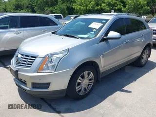 2015 Cadillac SRX Luxury Collection z VIN 3GYFNBE35FS627640, wystawiony jako IAAI lot #42262843 z przebiegiem 211 669 mil mil oraz . Historia ofert i sprzedaży dostępna na DreamBid. Obrazek 2.
