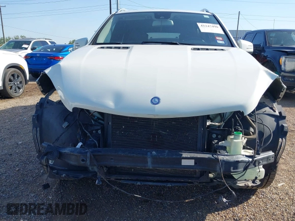 2013 Mercedes-Benz M 350 z VIN 4JGDA5JB2DA143975, wystawiony jako IAAI lot #42247490 z przebiegiem 114 899 mil mil oraz . Historia ofert i sprzedaży dostępna na DreamBid. Obrazek 13.