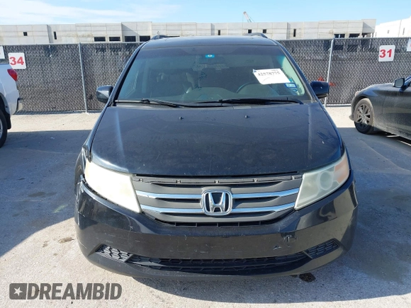 2012 Honda Odyssey EX-L z VIN 5FNRL5H63CB046447, wystawiony jako IAAI lot #42578775 z przebiegiem 247 852 mil mil oraz . Historia ofert i sprzedaży dostępna na DreamBid. Obrazek 12.