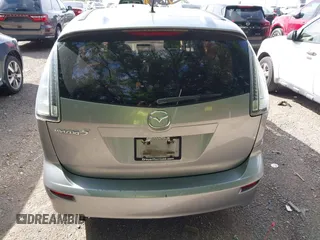 2010 Mazda 5 Sport with VIN JM1CR2W31A0384307, listed as a IAAI auction lot 42305589 with 144,372 mi miles and . Bid and sale history available at DreamBid. Image 13.