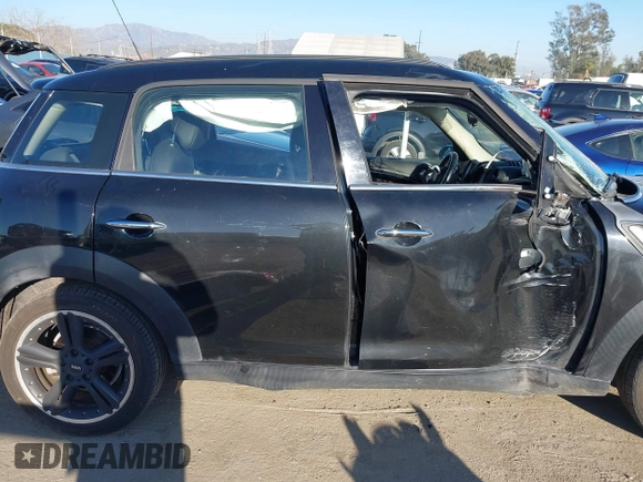 2013 MINI Countryman S z VIN WMWZC3C57DWP22928, wystawiony jako IAAI lot #41665753 z przebiegiem Nie podano mil oraz . Historia ofert i sprzedaży dostępna na DreamBid. Obrazek 13.