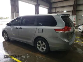 2011 Toyota Sienna with VIN 5TDZK3DC0BS112689, listed as a Copart auction lot 51651395 with 176,124 mi miles and Salvage Title. Bid and sale history available at carsss.com. Image 2.