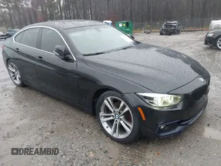 2019 BMW 4 Series 430i with VIN WBA4J1C55KBM16738, listed as a IAAI auction lot 41559766 with 103,258 mi miles. Bid and sale history available at carsss.com. Image 1.