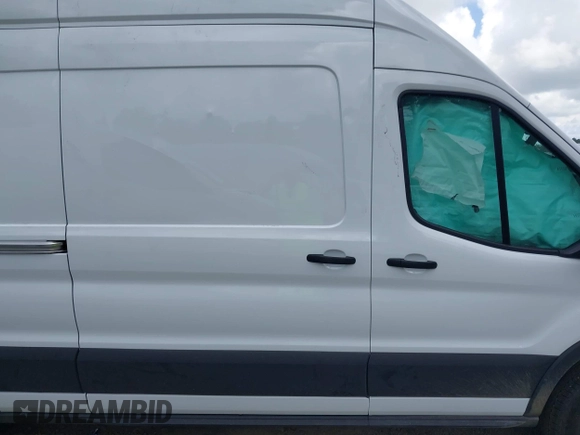 2024 Ford Transit Cargo with VIN 1FTBR3X86RKA46123, listed as a IAAI auction lot 42490695 with 13,258 mi miles and . Bid and sale history available at DreamBid. Image 13.