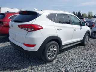 2018 Hyundai Tucson SEL with VIN KM8J3CA4XJU771344, listed as a IAAI auction lot 41987594 with 55,752 mi miles. Bid and sale history available at carsss.com. Image 4.