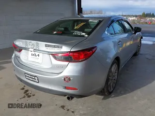 2017 Mazda Mazda6 Touring with VIN JM1GL1V50H1144637, listed as a IAAI auction lot 41849569 with 100,047 mi miles. Bid and sale history available at carsss.com. Image 4.