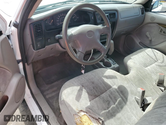 2001 Toyota Tacoma z VIN 5TENL42N01Z725533, wystawiony jako Copart lot #65078755 z przebiegiem 139 312 mil mil oraz Czysty tytuł • Clean title. Historia ofert i sprzedaży dostępna na DreamBid. Obrazek 8.
