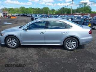 2018 Volkswagen Passat SE z VIN 1VWBA7A38JC004818, wystawiony jako IAAI lot #42205205 z przebiegiem 105 559 mil mil oraz . Historia ofert i sprzedaży dostępna na DreamBid. Obrazek 15.