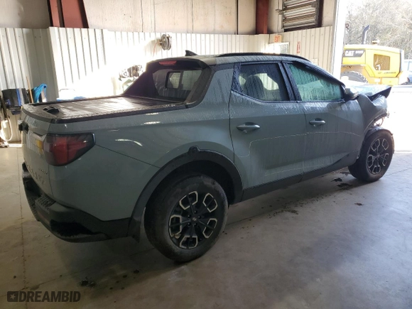 2022 Hyundai Santa Cruz SEL Premium with VIN 5NTJDDAF4NH003434, listed as a Copart auction lot 48961235 with 32,865 mi miles and Salvage Title. Bid and sale history available at carsss.com. Image 3.