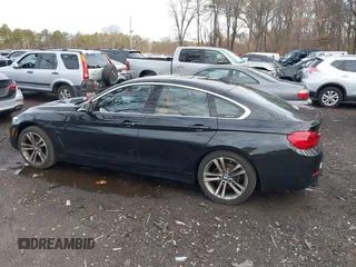 2018 BMW 4 Series 430i xDrive with VIN WBA4J3C56JBG91516, listed as a IAAI auction lot 41824273 with 102,932 mi miles and . Bid and sale history available at DreamBid. Image 14.