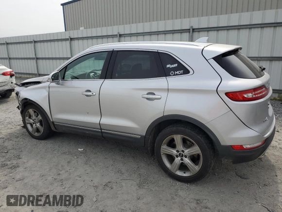 2017 Lincoln MKC Premiere with VIN 5LMCJ1C91HUL32617, listed as a Copart auction lot 57444215 with 106,285 mi miles and Salvage title. Bid and sale history available at DreamBid. Image 2.