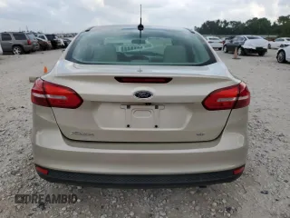 2017 Ford Focus SE с VIN 1FADP3F23HL318623, выставлен на аукционе Copart как лот 55286675 с пробегом 61 147 миль миль и Списание • Salvage title. История ставок и продаж доступна на DreamBid. Изображение 6.