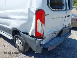 2018 Ford Transit z VIN 1FTYR1YM3JKB16286, wystawiony jako IAAI lot #42038526 z przebiegiem 135 734 mil mil oraz . Historia ofert i sprzedaży dostępna na DreamBid. Obrazek 6.