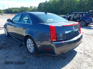 2013 Cadillac CTS Luxury with VIN 1G6DE5E5XD0146158, listed as a IAAI auction lot 42531205 with 130,669 mi miles and . Bid and sale history available at DreamBid. Image 3.