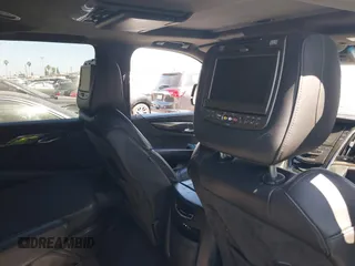 2016 Cadillac Escalade Platinum z VIN 1GYS4DKJ6GR290318, wystawiony jako IAAI lot #40090625 z przebiegiem Nie podano mil oraz . Historia ofert i sprzedaży dostępna na DreamBid. Obrazek 18.
