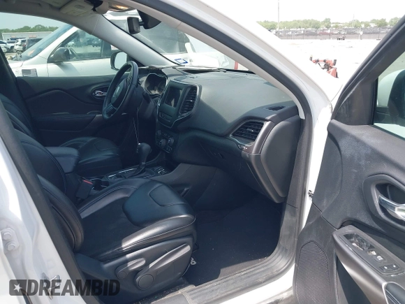 2019 Jeep Cherokee Latitude Plus with VIN 1C4PJLLBXKD220221, listed as a IAAI auction lot 42060125 with 89,452 mi miles and . Bid and sale history available at DreamBid. Image 5.