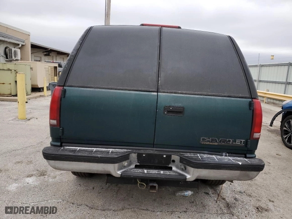 1997 Chevrolet Tahoe with VIN 1GNEK13R5VJ420751, listed as a Copart auction lot 44770025 with 236,378 mi miles and Salvage Title. Bid and sale history available at carsss.com. Image 6.