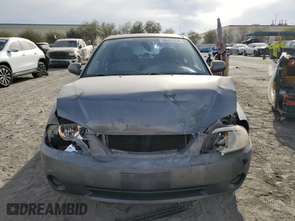 2003 Kia Spectra with VIN KNAFB121935265035, listed as a Copart auction lot 86407934 with 201,586 mi miles and Salvage Title. Bid and sale history available at DreamBid. Image 5.