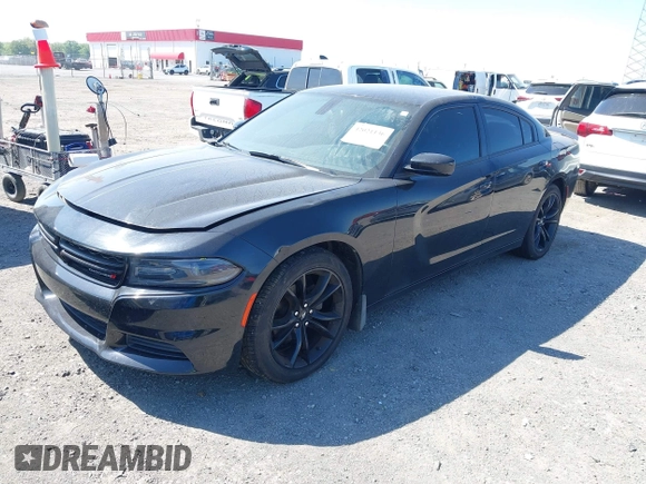 2018 Dodge Charger SXT with VIN 2C3CDXBG8JH134938, listed as a IAAI auction lot 42021136 with 127,596 mi miles and . Bid and sale history available at DreamBid. Image 2.