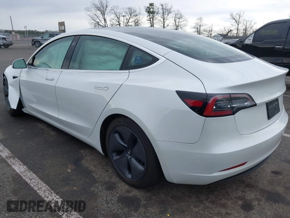 2020 Tesla Model 3 Standard Range Plus z VIN 5YJ3E1EA3LF590450, wystawiony jako IAAI lot #42026296 z przebiegiem 68 242 mil mil oraz . Historia ofert i sprzedaży dostępna na DreamBid. Obrazek 3.