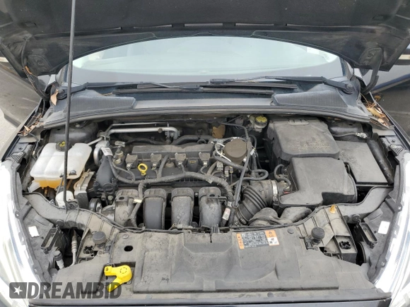 2015 Ford Focus Titanium z VIN 1FADP3N25FL324390, wystawiony jako Copart lot #59801805 z przebiegiem 97 615 mil mil oraz Szkoda całkowita • Salvage title. Historia ofert i sprzedaży dostępna na DreamBid. Obrazek 11.