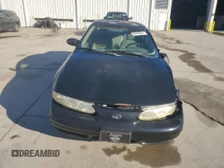 2000 Oldsmobile Alero GLS z VIN 1G3NF52E5YC322556, wystawiony jako Copart lot #85916554 z przebiegiem 169 600 mil mil oraz Szkoda całkowita • Salvage title. Historia ofert i sprzedaży dostępna na DreamBid. Obrazek 5.