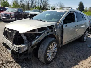 2017 Cadillac XT5 Premium Luxury AWD z VIN 1GYKNERS2HZ127538, wystawiony jako Copart lot #54570095 z przebiegiem 108 037 mil mil oraz Szkody całkowita. Historia ofert i sprzedaży dostępna na DreamBid. Obrazek 1.