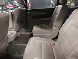 2014 Honda Odyssey Touring with VIN 5FNRL5H94EB105745, listed as a IAAI auction lot 41744012 with 77,032 mi miles and . Bid and sale history available at DreamBid. Image 8.