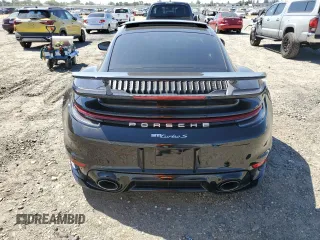 2022 Porsche 911 Turbo S z VIN WP0AD2A91NS255804, wystawiony jako Copart lot #56250395 z przebiegiem 5193 mil mil oraz Szkody całkowita. Historia ofert i sprzedaży dostępna na DreamBid. Obrazek 6.