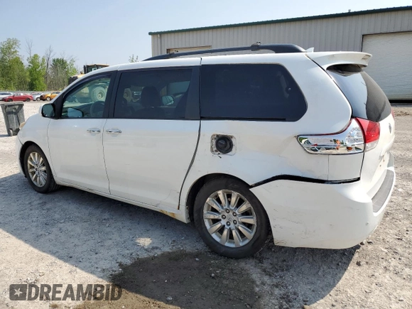 2011 Toyota Sienna XLE with VIN 5TDDK3DC4BS004280, listed as a Copart auction lot 59297345 with 173,890 mi miles and Salvage title. Bid and sale history available at DreamBid. Image 2.